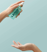 Animated GIF showing a hand dispensing a pump of La Nua 100ml water-based lubricant.