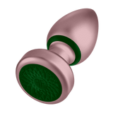 An angled view of the Bougie Plug's flared base, showing the green, textured surface on the bottom.