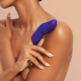 A model wearing the FemmeFunn Dioni finger vibrator small. 