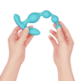 Hands holding the FemmeFunn Funn Beads in teal.