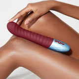 A model holding the FemmeFunn Lola G in maroon.