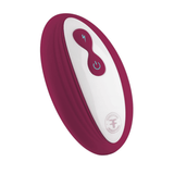 The maroon wireless remote control for the FemmeFunn Plua and Pyra anal toys