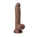 The FemmeFunn Thruster Baller realistic thrusting vibrator in a cocoa brown color.