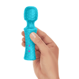 A hand holding the FemmeFunn Ultra Wand Mini in teal.