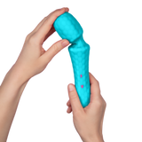 Hands holding the FemmeFunn Ultra Wand in teal.