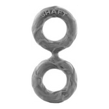 A gray silicone double cock ring, featuring two connected circular loops, viewed from the side.