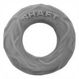 A gray silicone cock ring, smooth and circular, viewed from the side.