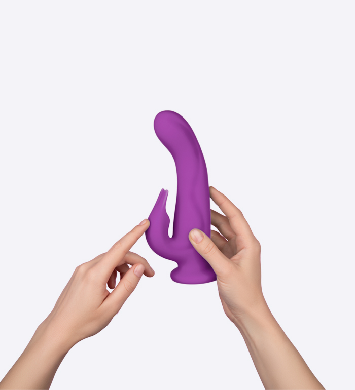 Pirouette-Purple-Rotating-Rabbit-Vibrator-In-Hand