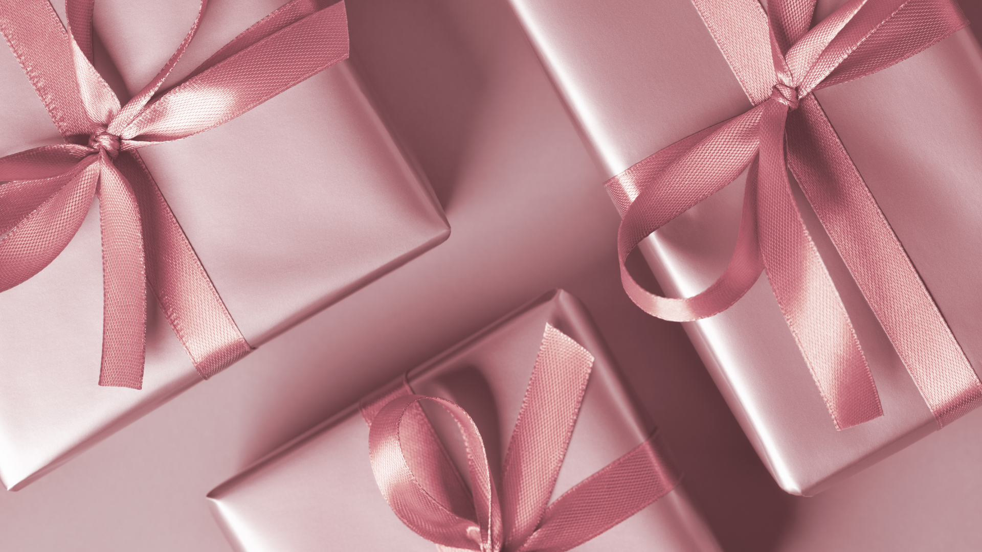 pink gift boxes with ribbons